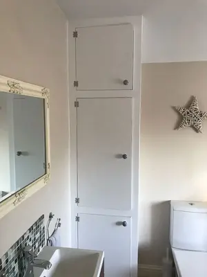 Bespoke media wall installation by JM Carpentry Slough