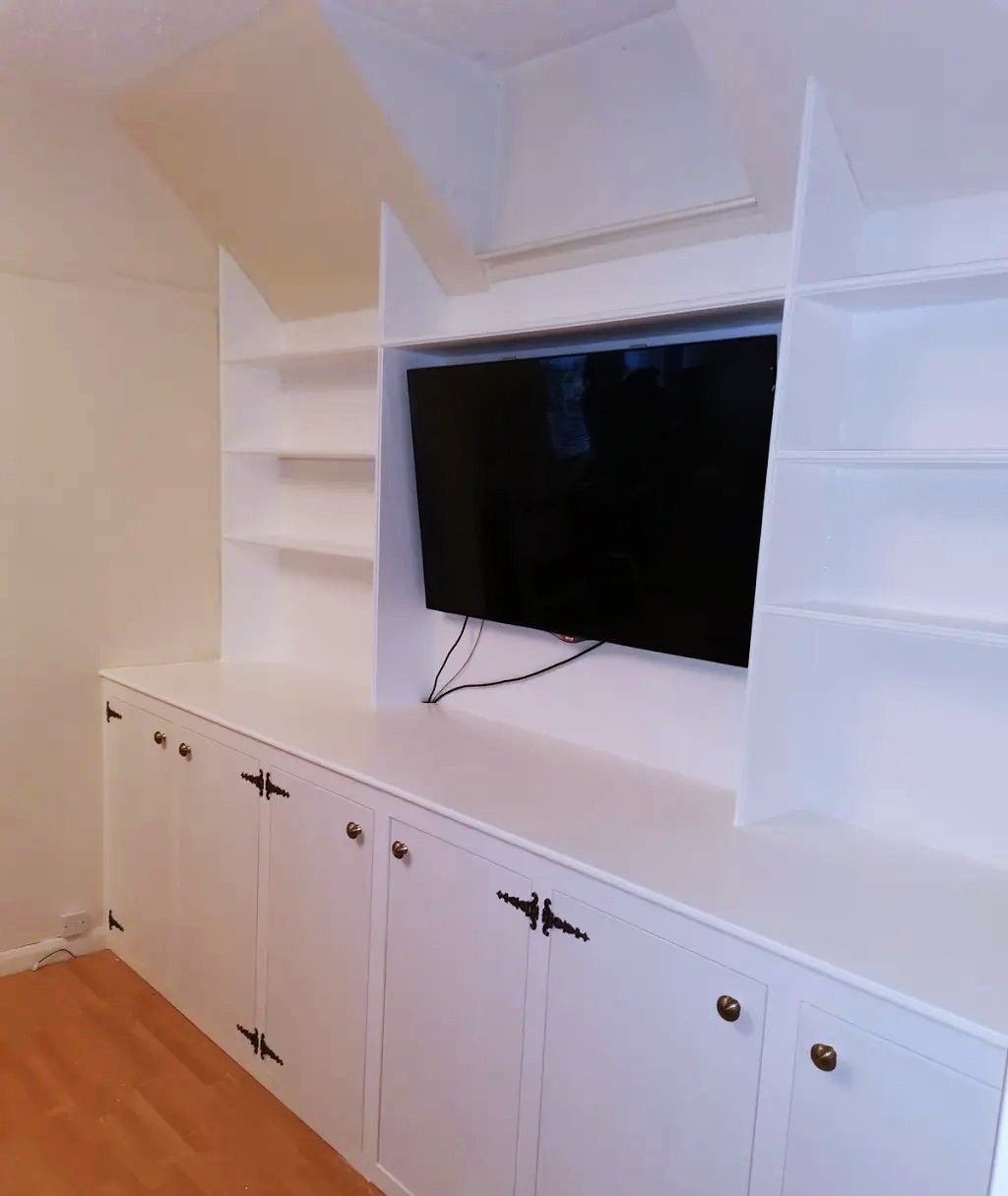 Bespoke media wall installation in Slough by JM Carpentry & Sons Ltd